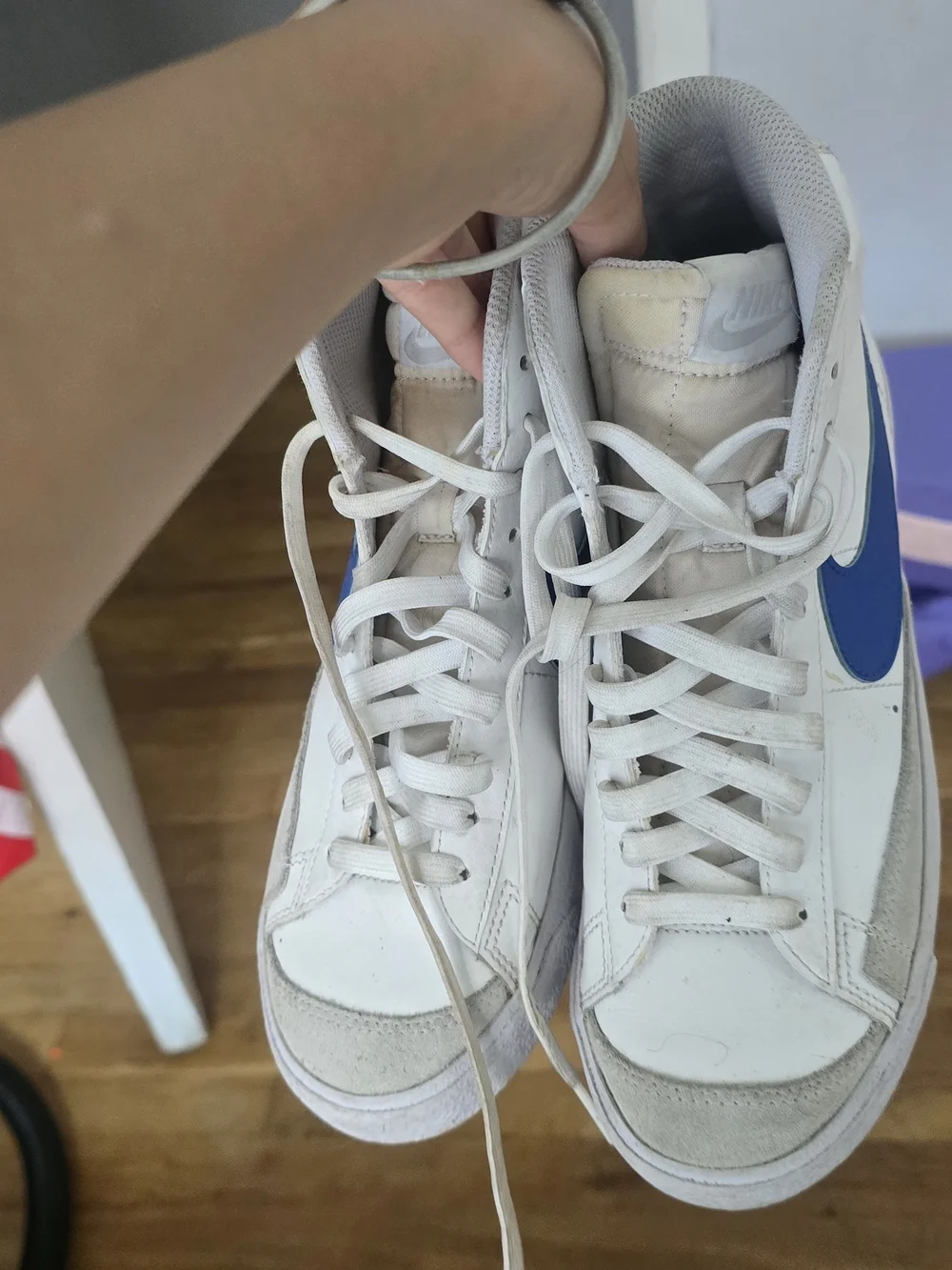 Nike White High-Top Sneakers with Blue Swoosh